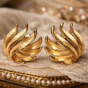 Vintage Crown Trifari brushed gold tone finish leaf clip-on earrings